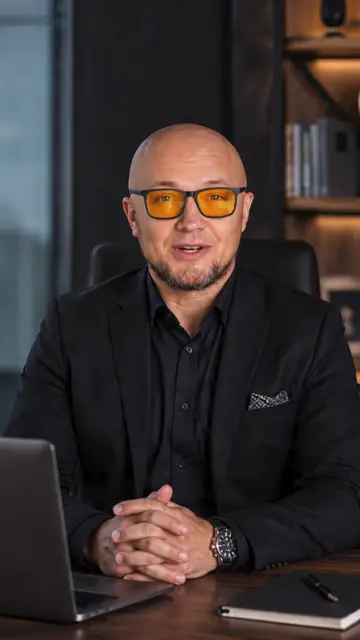Business video frame with an AI headline and captions